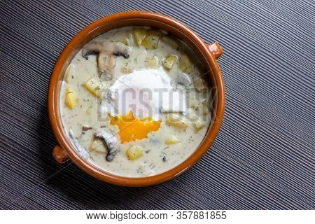 dill soup with poached egg