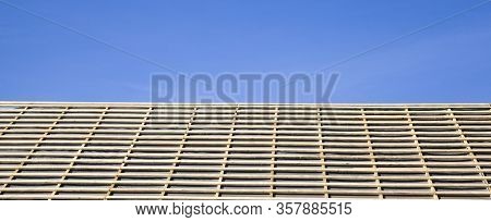 Covered With Water-proof Materials, The Roof Of The Building Is Covered With A Rigid Frame Of Boards
