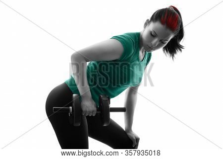 Fit Attractive Young Woman Working Out With A Set Of Dumbbells, Doing Bent-over Row, Backlit Silhoue