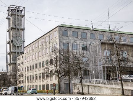 Aarhus, Denmark - 24 March 2020:  Aarhus City Hall With The Famous Tower Clock In The Background