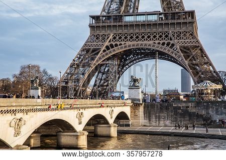 Paris , France - December 15, 2019: View On The Famous Paris Eiffel Tower From The Promenade Of The 