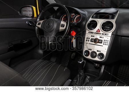 Opel Corsa - Close-up Of The Dashboard, Player, Steering Wheel, Accelerator Handle, Buttons, Seats.n