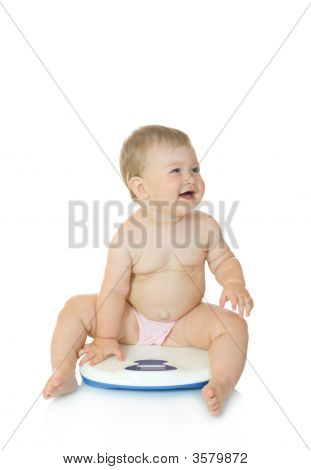 Small Baby On Home Scales Isolated