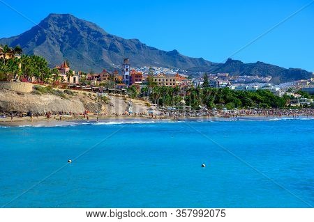 All Year Sun Travel Destination In Europe, Blue Ocean Water On Beach Playa Del Duque In Costa Adeje,