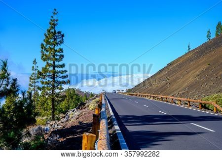 Driving Car On Volcano Mount Teide And Lava Fiels On Tenerife Island, Canary, Spain