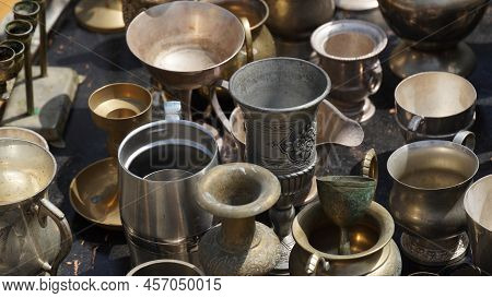 Bronze And Metal Objects Sold On A Street Flee Market. Antiquities At The Flee-market.