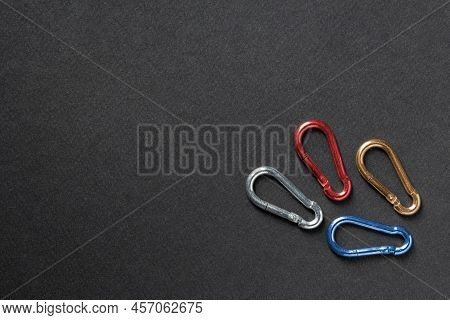 4mm Climbing Carabiner Isolated Against A Dark Background