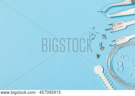 A Set Of Special Tools For An Orthodontist To Install Braces For A Patient. Orthodontic Arcs, Ligatu