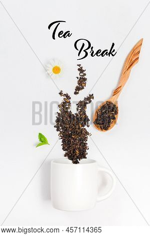Teacup And Scattered Red Tea Leaves In Steam Shape. Mockup With Tea And Tea Cup Composition, Copy Sp
