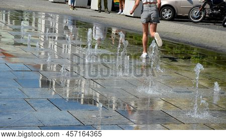 On The Square There Are Spray Nozzles In A Regular Grid Which Spray Upwards According To The Program