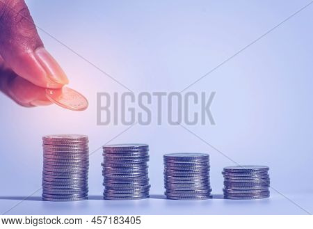 Save Money And Account Banking For Finance Concept, Hand With Coin On Blurred Background, Save Monne