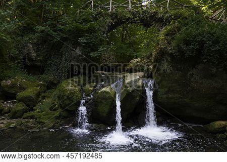 Fairytale Rocky Landscape With Waterfall The Schiessentumpel And Bridge In The Ardennes Forest Durin