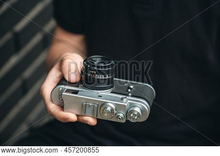 Close-up, Vintage Film Retro Camera In Male Hands.