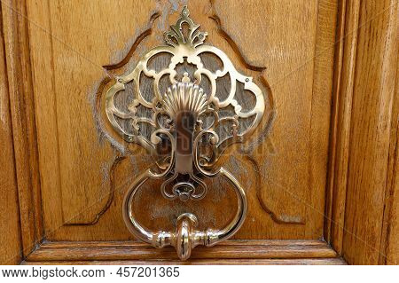 European Vintage Old Metal Wrought Iron Door Knocker. Design Detail. Paris.