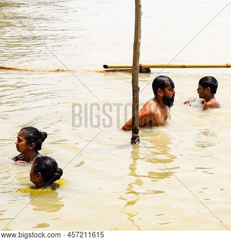 Garh Mukteshwar, Uttar Pradesh, India - June 11 2022 - People Are Taking Holy Dip On The Occasion Of