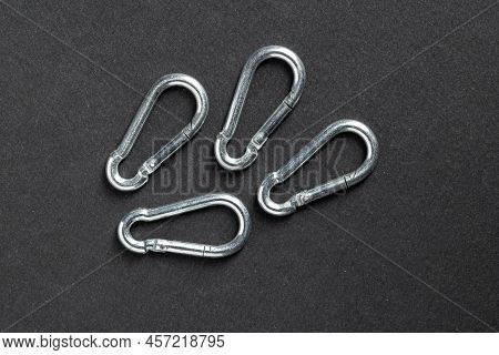 4mm Climbing Carabiner Isolated Against A Dark Background