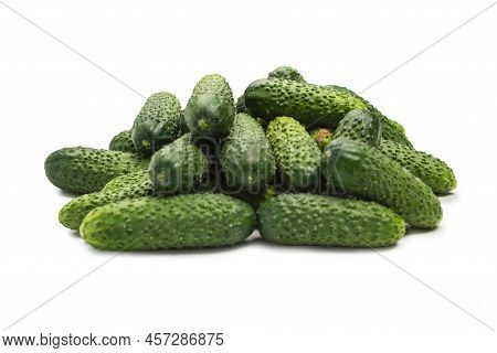 Fresh Green Cucombers As A Background. Top View.
