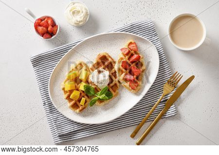 Tasty Breakfast With Croffles And Morning Coffee, Strawberries. Croissant As Waffle.
