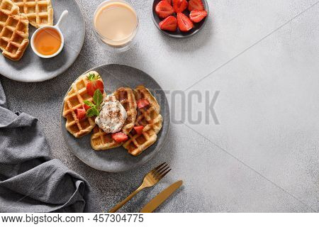 Trendy Breakfast With Croffles And Morning Coffee, Strawberries. Croissant As Waffle.