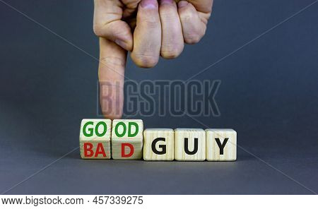 Good Or Bad Guy Symbol. Businessman Turns Cubes And Changes Concept Words Bad Guy To Good Guy. Beaut