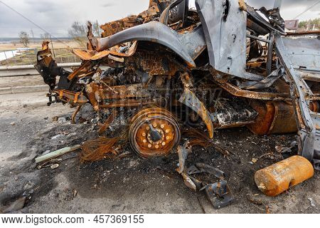 Hostomel, Kyev Region Ukraine - 09.04.2022: Burnt Military Vehicles Of Russian Soldiers On The Bridg