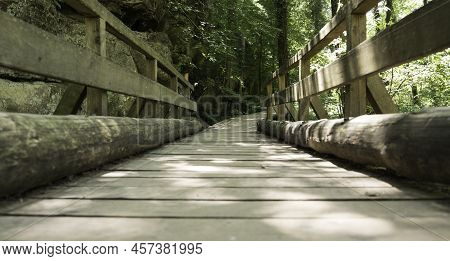 Wooden Decking On A Walking Path In Luxembourgs Mullerthal With Wooden Railings On The Side Of The B