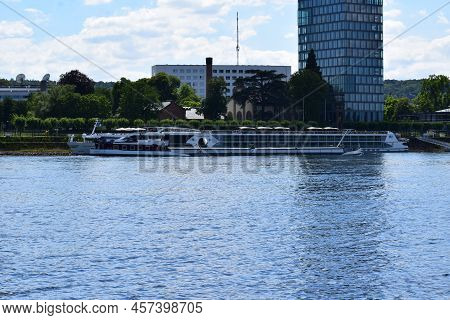 Bonn, Germany - 06 28 2022: Ship On The Rhine In Front Of The Skyline Of Bonn
