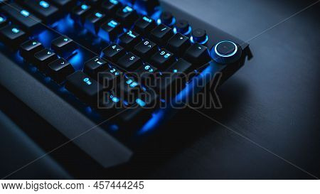 Advanced Features Of Blue Buttons Keyboard For Gamers. Digital Keypad Close Up Photo Of Gaming Keybo