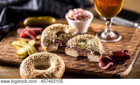 Bagel Filled With Juicy Beef Pastrami Together With Pickles