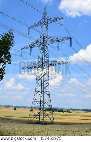 Single Electric Pylon In The Ripe Grain Fields
