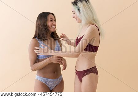 Body Positivity And Self Acceptance Women Dance Together. Latin Lingerie Unaltered Imagery