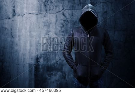 Hacker Standing Alone In Dark Room. Empty Space For Text Or Draw