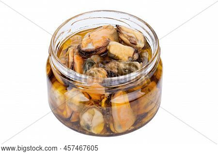 Marinated Mussels Isolated In A Jar On A White Background. Full Depth Of Field. File Contains Clippi