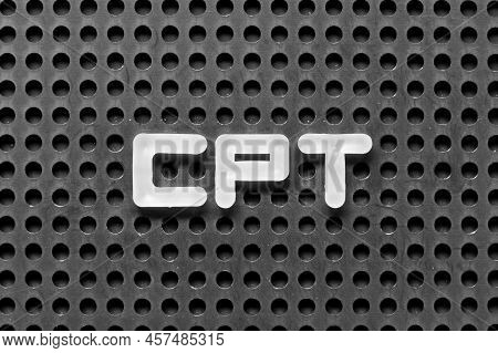 White Alphabet Letter In Word Cpt (abbreviation Of Carriage Paid To) On Black Pegboard Background