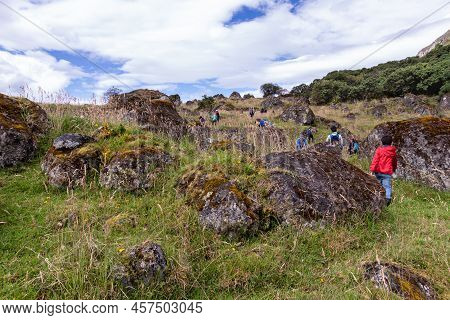Azuay, Ecuador - May 29, 2022: Tourist On Hiking Trail Through 'stones Garden' To Mountain San Pablo
