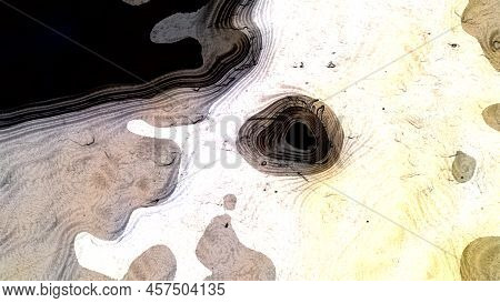 Light Brown Abstraction From Different Spots. Between The Light Brown Spots One Large White Spot And