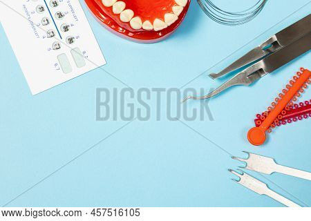 A Set Of Special Tools For An Orthodontist To Install Braces For A Patient. Orthodontic Arcs, Ligatu