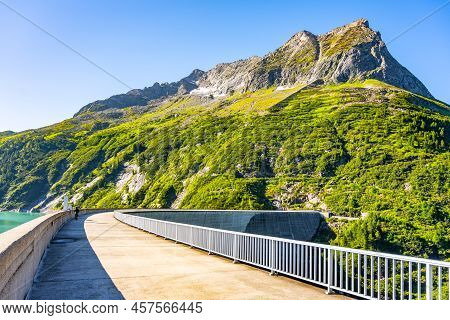 Huge Concrete Apline Dam On Sunny Summer Day. Zillergrundl Speicher, Zillertal Alps, Austria