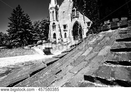 Omaha, Nebraska, Us - 5.2022 - Selective Focus On Fountain In Front Of St. Johns Parish Catholic Chu