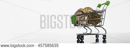Close-up Of Basket Filled With Coins Crypto Currency Bitcoin Ethereum Litetcoin. Virtual Money On Gr