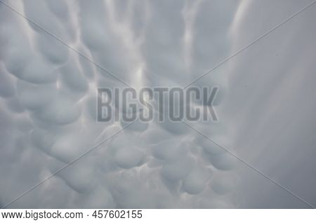Storm Clouds Of Fluffy Puffy Shape The Beginning Of A Bubble-shaped Thunderstorm, Steel-gray Color T