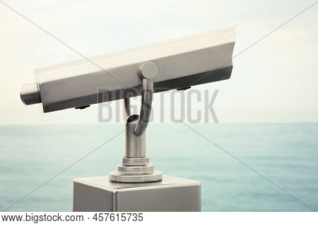 Metal Tower Viewer Installed Near Sea. Mounted Binoculars