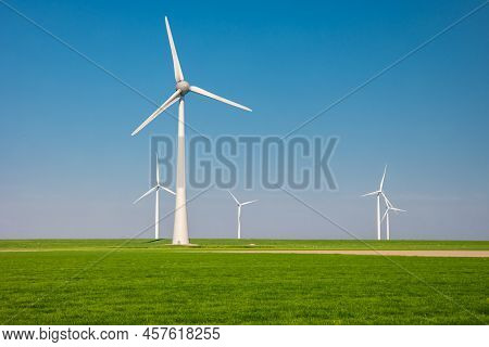 Windmill Park In The Ocean, Drone Aerial View Of Windmill Turbines Generating Green Energy Electric,