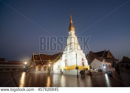 Sakon Nakorn , Thailand - December 25 , 2018 : Ancient White Pagoda In Wat Phra That Choeng Chum Wor