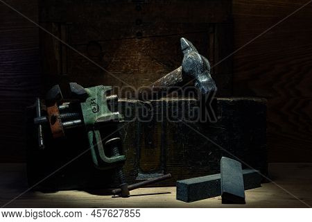 Old Tools And A Wooden Box. Still Life Of Tools. Low Keys.