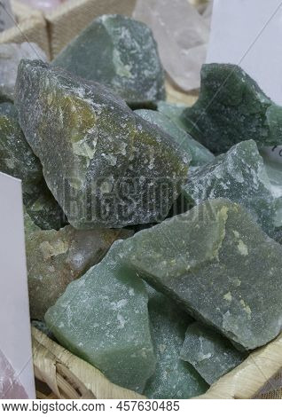 Green Quartz Fragments, Believed To Have Beneficial Health Properties. Displayed On Basket At Street