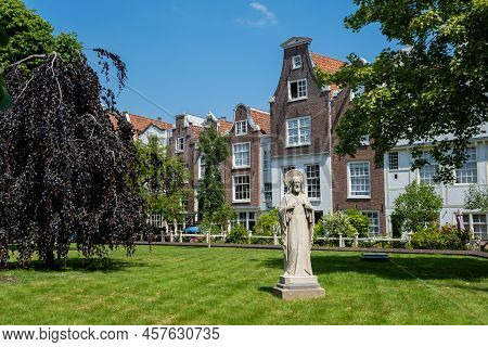 Amsterdam, The Netherlands - 23 June 2022: The Begijnhof Is One Of The Oldest Hofjes (courtyard) In 