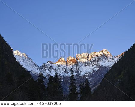 Mount Jiariren-an Of The Meili Snow Mountains At Sunrise In China's Yunnan Province
