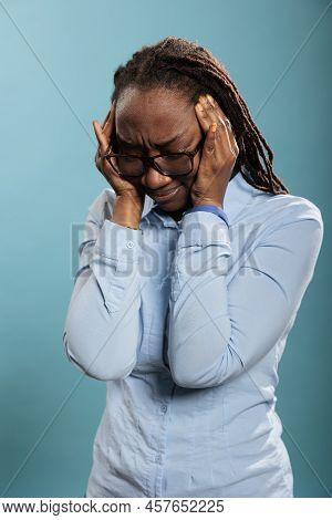 Stressed Young Adult Person With Hypertension Feeling Sick Because Of Headache. Unwell And Ill Woman