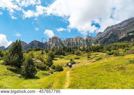 A Hiker On The Trek To The Piedrafita Arch In The Pyrenees In Panticosa, Aragon